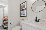 Convenient half bath & laundry room on the main level of this home